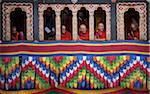 Senior monks in window at Tashi Chodzong during Buddhist Thimpu Festival