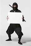 Ninja Holding A Whiteboard