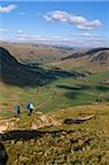 England, Cumbria. Walkers above Great Langdale
