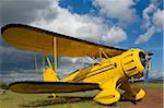 Kenya, Laikipia, Lewa Downs. Will Craig's 1930s style Waco Classic open cockpit bi-plane for the ultimate aerial safari.