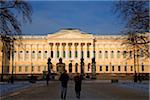 Russia, St. Petersburg; People walking in front of the majestic and spectacular Russian Museum.