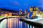 Spain, Basque Country, Bilbao, The Guggenheim, designed by Canadian-American architect Frank Gehry, on the Nervion River