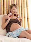 Pregnant woman eating sweets