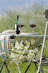 Bread and wine on table outdoors