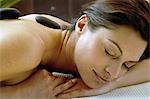 Woman receiving Lastone therapy