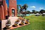 Zambia; Livingstone. Grounds and swimming pool at the Zambezi Sun hotel near Victoria Falls.