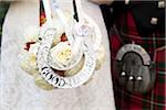 Bride and Groom with Bouquet Decorated with Horseshoes