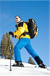 Man Snowshoeing