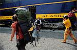 Passengers prepare to board Alaska Railroad's Chugach Explorer for a whistle stop ride to Spencer Glacier, Southcentral Alaska, Summer