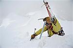 Backpacker approaches the summit of Mt. Chamberlin in the Brooks Range, ANWR, Arctic Alaska, Summer