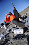 Hiker relaxes at basecamp in the Hulahula River Valley on the northern edge of ANWR, Brooks Range, Arctic Alaska, Summer