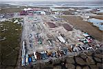 Aerial view of staged oil drilling supplies and equipment in the Prudhoe Bay oil field, Arctic Alaska, Summer