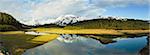Panorama of the peaks of Heney Ridge and the tidal flats of Heney Creek in the evening, Chugach National Forest, Copper River Delta, Southcentral Alaska, Spring