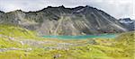 Scenic panorama of Lower Reed Lake in the Talkeetna Mountains, Archangel Valley, Hatcher Pass, Southcentral Alaska, Summer