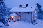 Une maison, l'hiver, Malmbergen, Laponie, Suède.