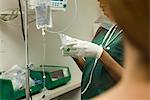 Nurse preparing medical equipment