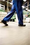 Factory worker walking, low section