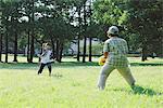 Friends Playing With Ball In a Park