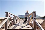 Man on Boardwalk, Cala Ratjada, Mallorca, Balearic Islands, Spain