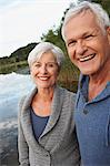 Senior couple in front of lake