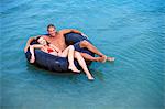 Couple swimming at the beach