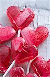 Red heart-shaped lollipops