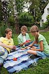 Siblings playing cards