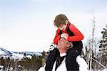 Grandson and grandfather smiling