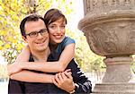 Happy couple embrace in paris park