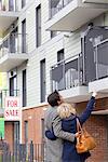 Couple looking at new apartment