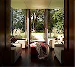 Ad Astra. Seating area with view to garden. Architects: Munkenbeck and Marshall