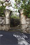 Grenada, Gateway with stone pillars and wrought iron gate