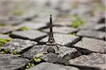 Miniature Eiffel Tower on Cobblestones