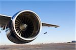 Close-Up of Airplane Engine on Runway