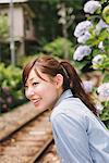 Young Woman Looking Near Railway Track