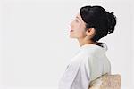 Side View Of Middle Aged Japanese Woman Studio Shot