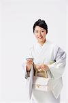 Traditional Japanese Woman Holding Purse