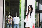 Young Woman Carrying Shopping Bags