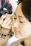 Japanese Woman getting Make-up on Face