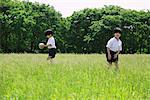 Boys Playing with Ball in Park