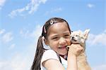 Girl Holding  Puppy