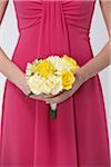 Close-up of Bridesmaid holding Bouquet