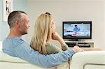 Couple watching television