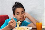 Boy Eating Pasta