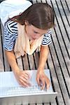 Young Woman Using Laptop Computer