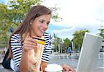 Young Woman Using Laptop Computer