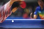 Men playing table tennis