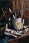 Bottle of Champagne in a bucket with paint brushes,glasses of Champagne