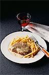 Steak with pepper sauce and french fries