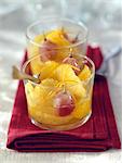 Grape and pineapple fruit salad with orange zests